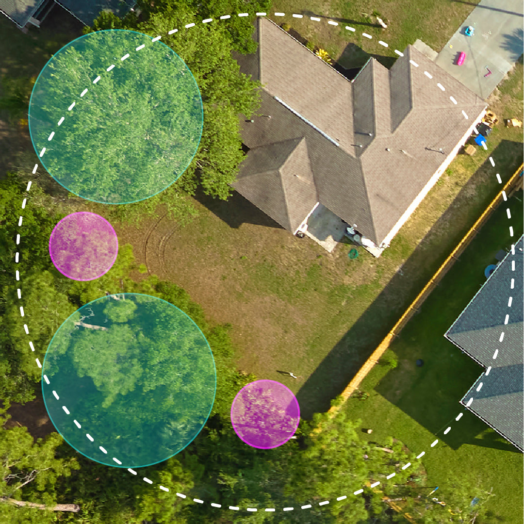 Aerial view of a house with a backyard, surrounded by trees and colorful circular overlays, representing mosquito trap reach