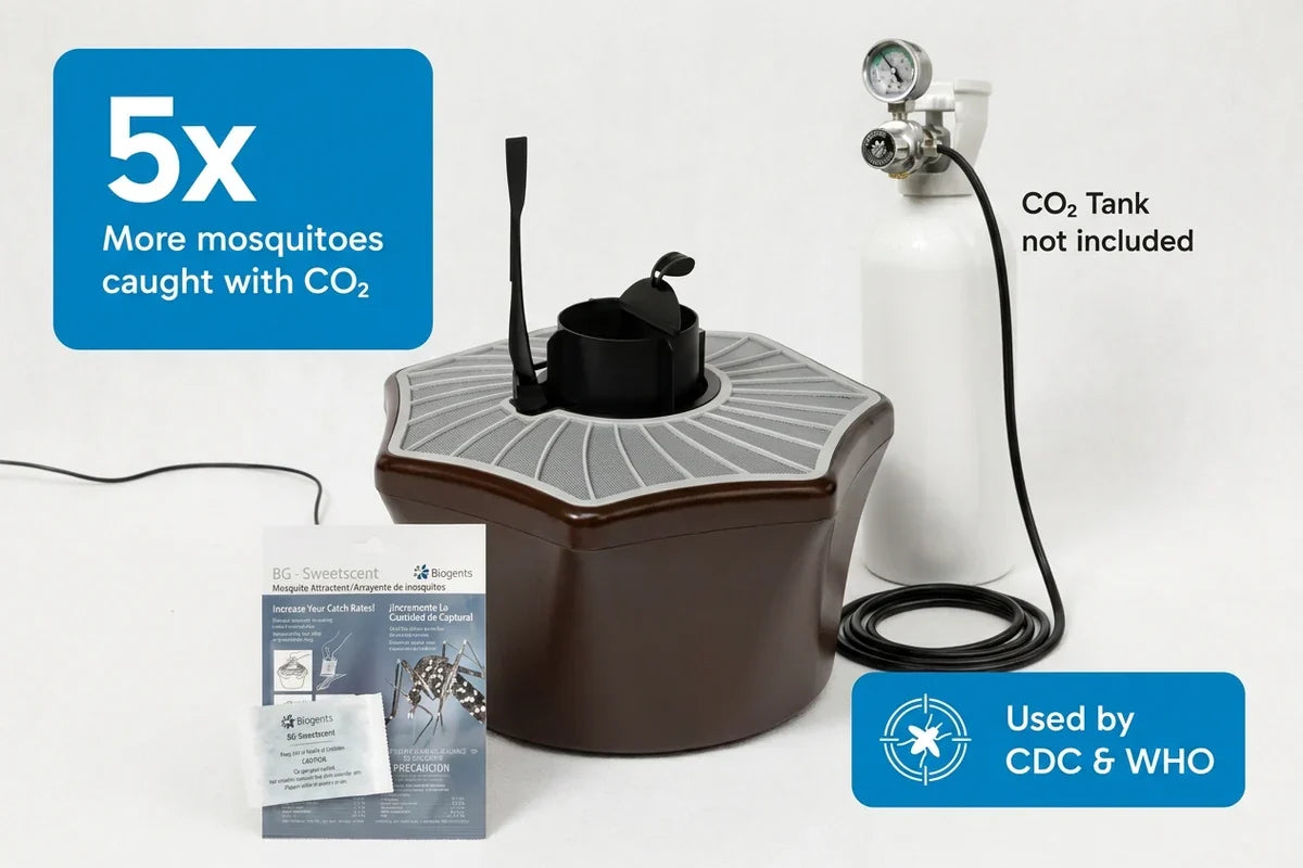 Mosquito trap with tubing and a white CO2 tank beside packaging and instruction materials.