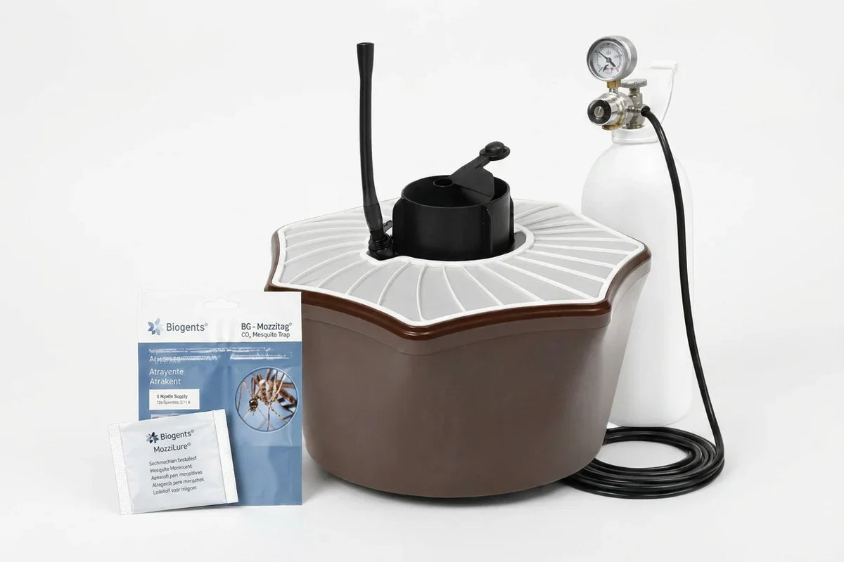 Brown-and-white mosquito trap beside a pressurized cylinder, coiled cable, and attractant packages.
